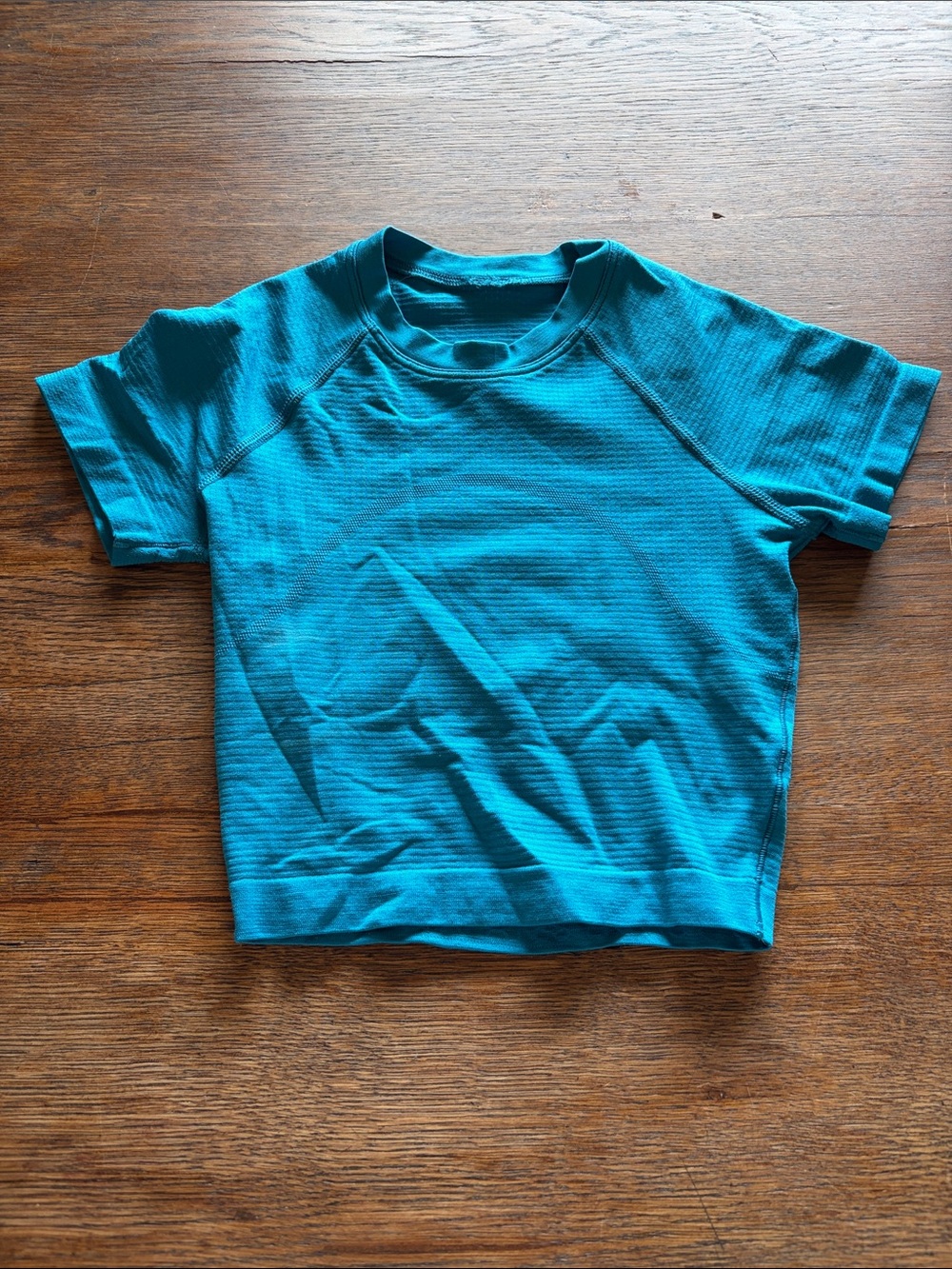 Cropped short sleeve Lululemon top, teal, size 0